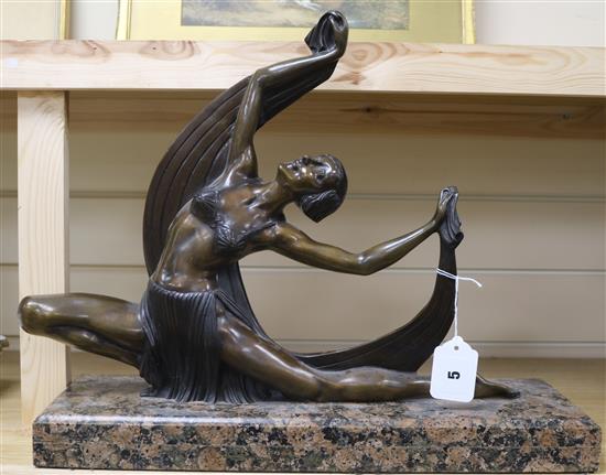 An Art Deco style bronze figure of a dancer H.39cm. W.47cm.